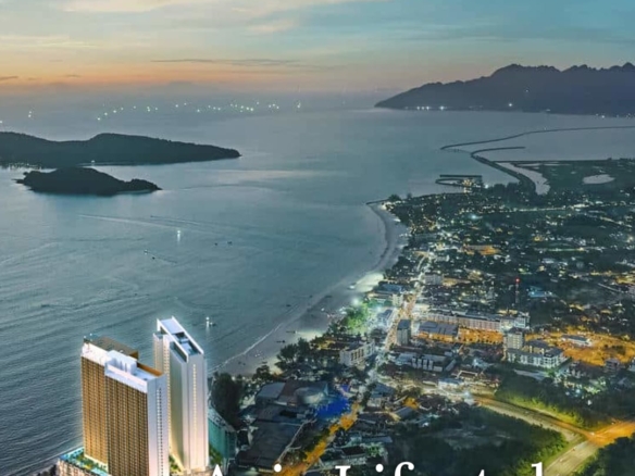 Clarissa Serviced Suites at dusk over Pantai Cenang, Langkawi