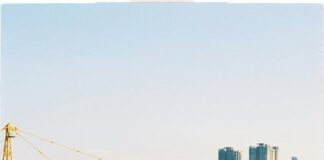 Vietnam’s Public Investment Surge: Implications for Infrastructure and Business in 2025โ2026 Crews pour a deck on an elevated expressway under construction in a Vietnamese coastal city