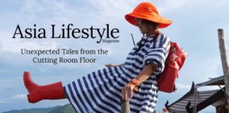 Unexpected Tales from the Cutting Room Floor A woman in a striped dress, orange sun hat and red wellington boots poses on a wooden jetty