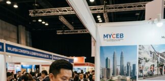 China Roadshow 2026: A Game Changer for Economic Impact with RM704 Million Boost! Delegates talk across a MyCEB stand at a Malaysian tourism trade roadshow