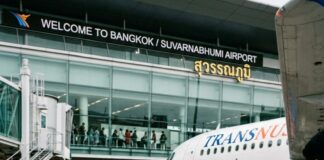 Passengers board a TransNusa aircraft by airstairs at Suvarnabhumi airport
