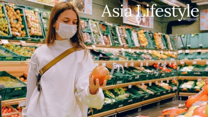 woman-wearing-mask-in-supermarket-3962287-1600w