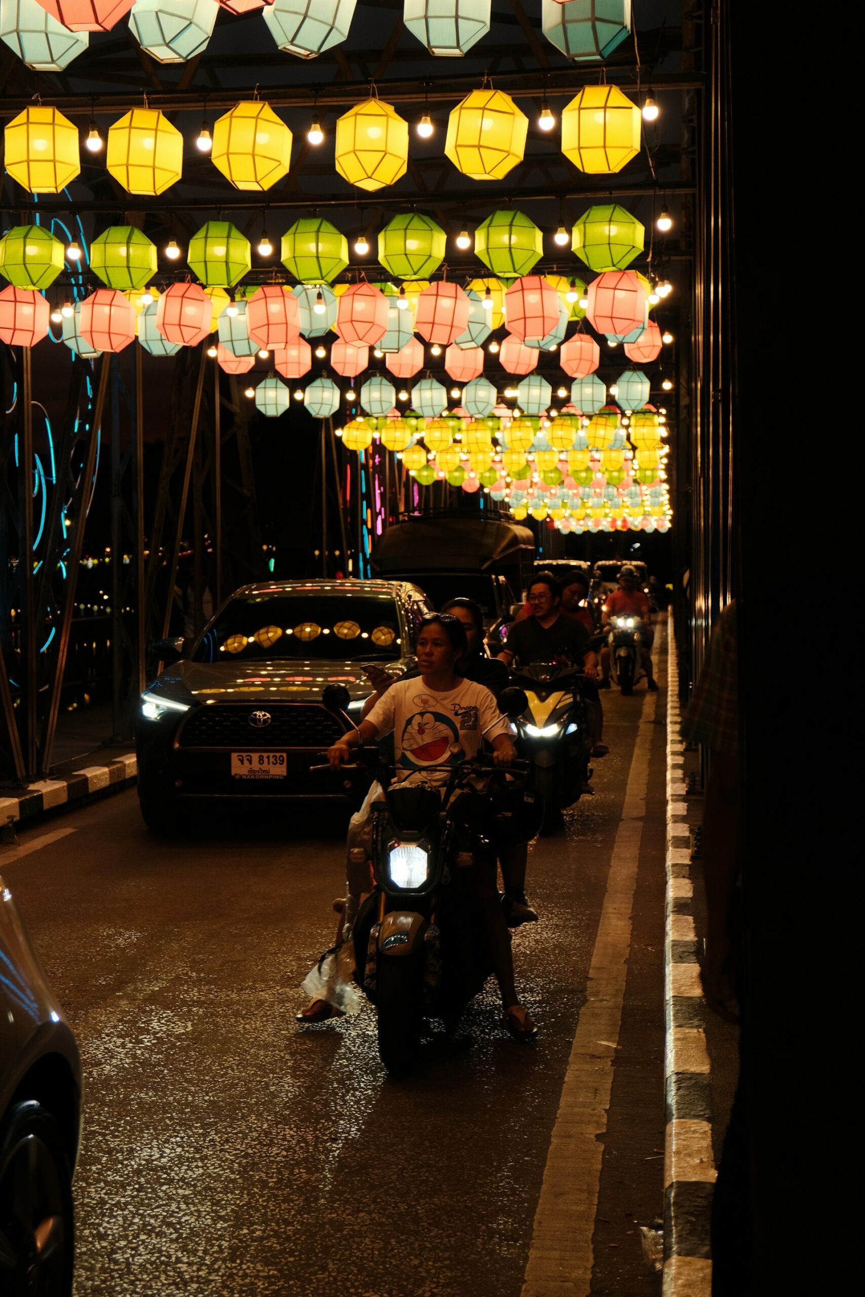 Bridge in Chiang Mai decorated with lanterns on the night of Loy Krathong