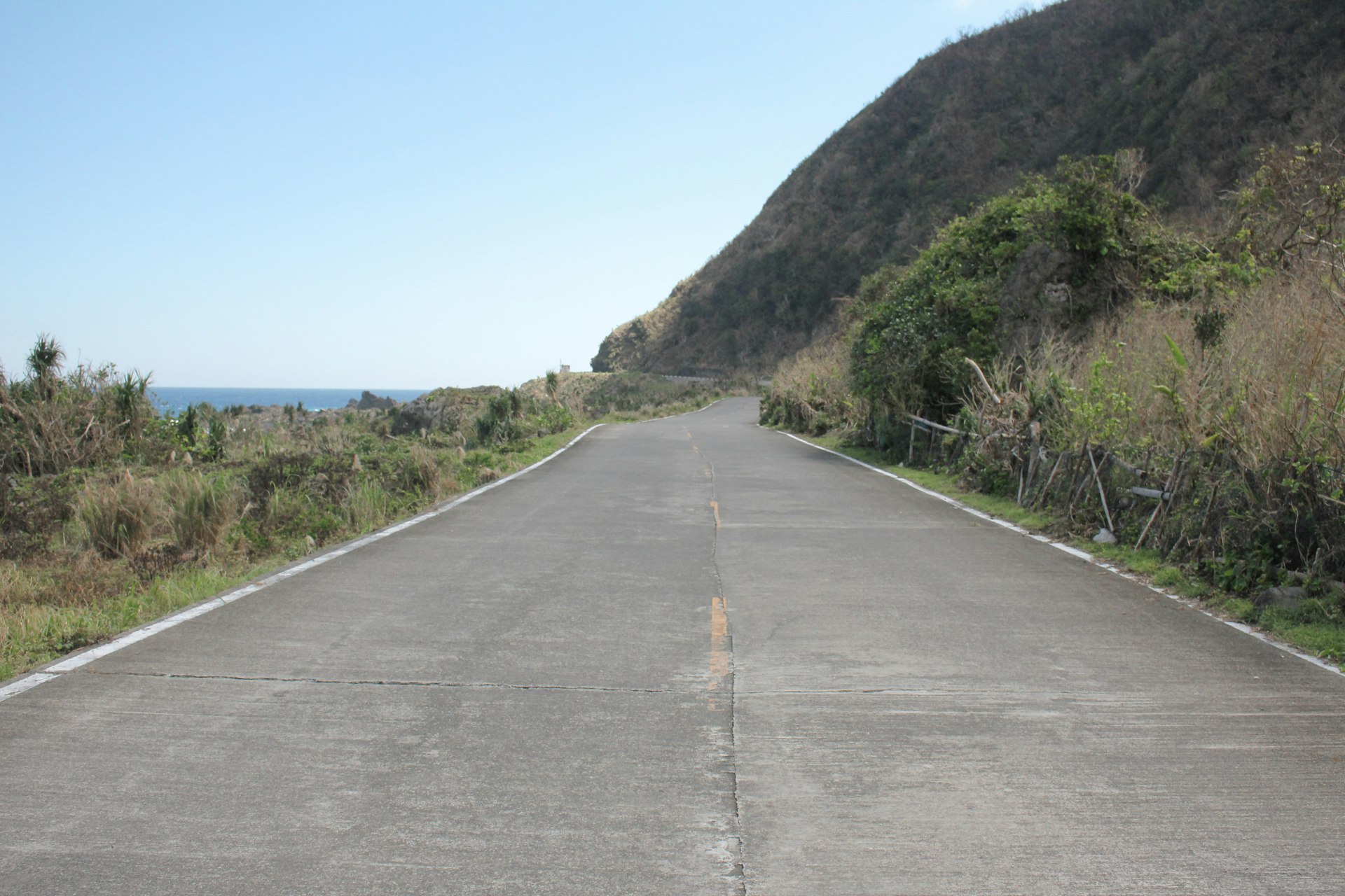 A quiet road leading down towards the sea on the Taiwan coast