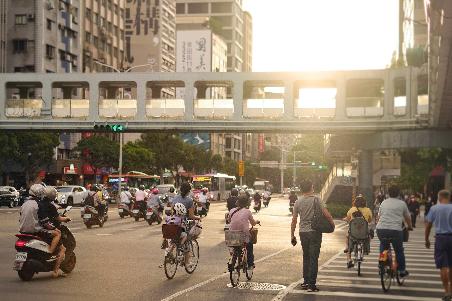 A group of cyclists riding together along a road in Taiwan