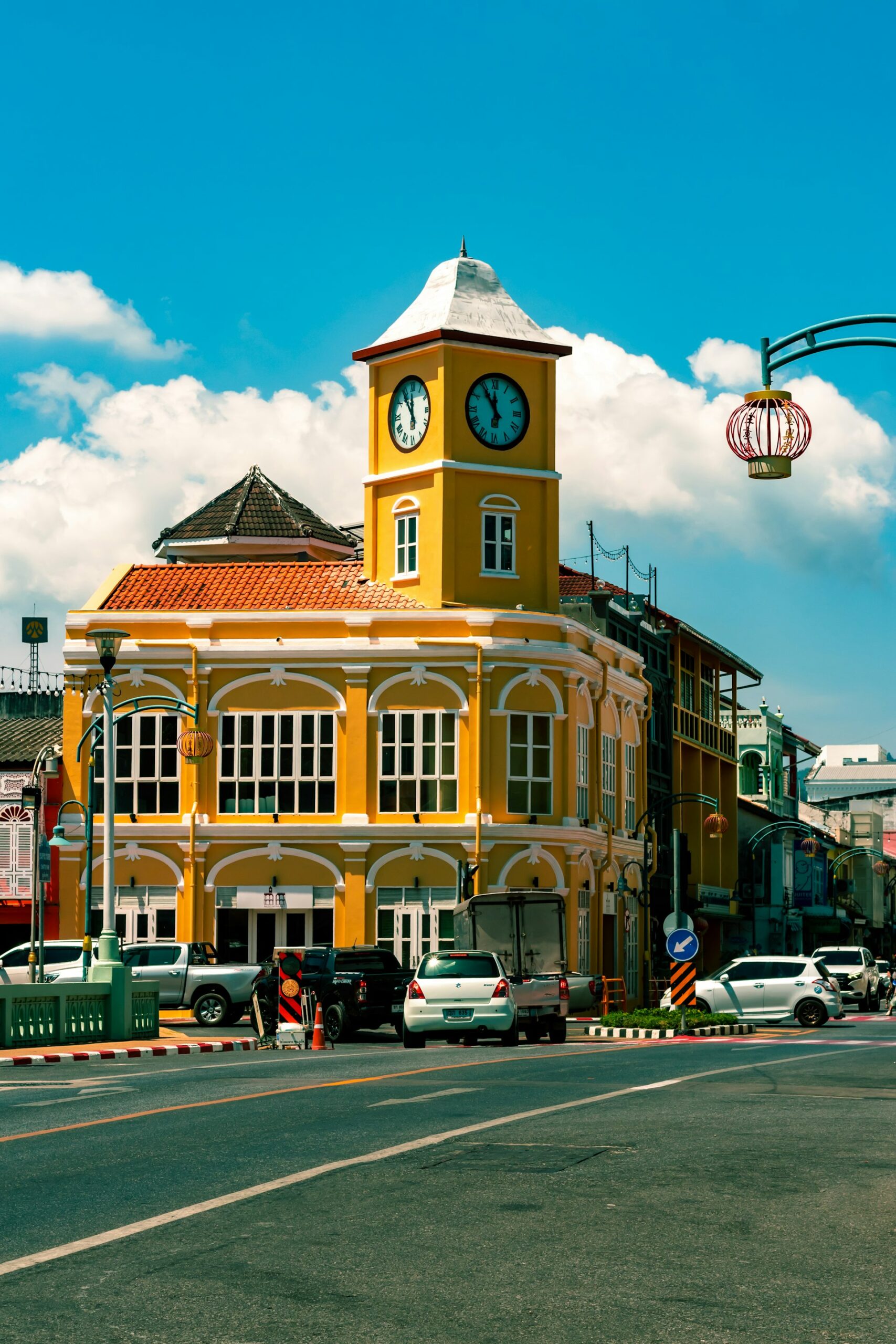 Historic yellow building with a clock in Phuket Old Town