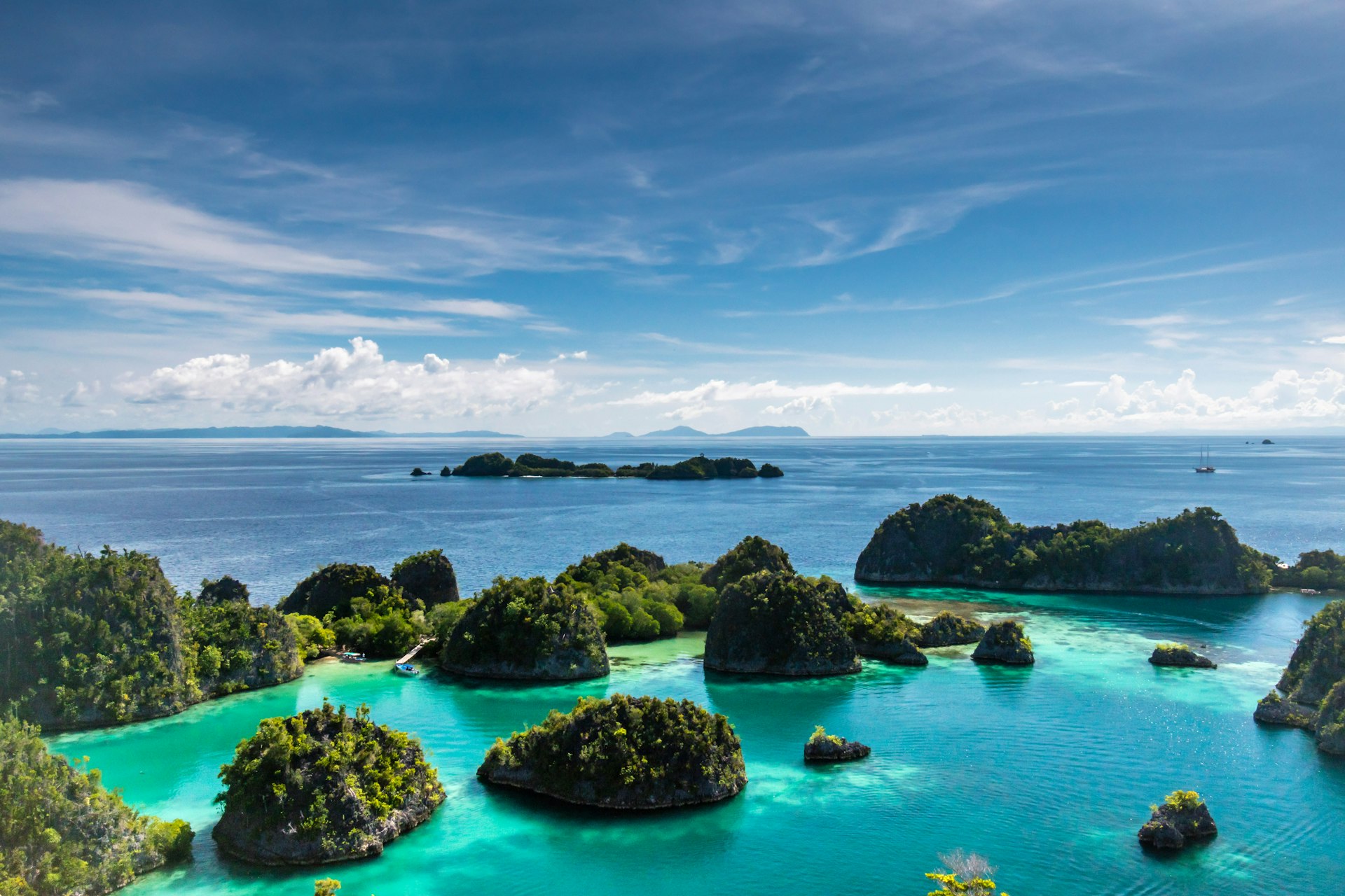 Karst islets surrounded by clear water in Raja Ampat, West Papua